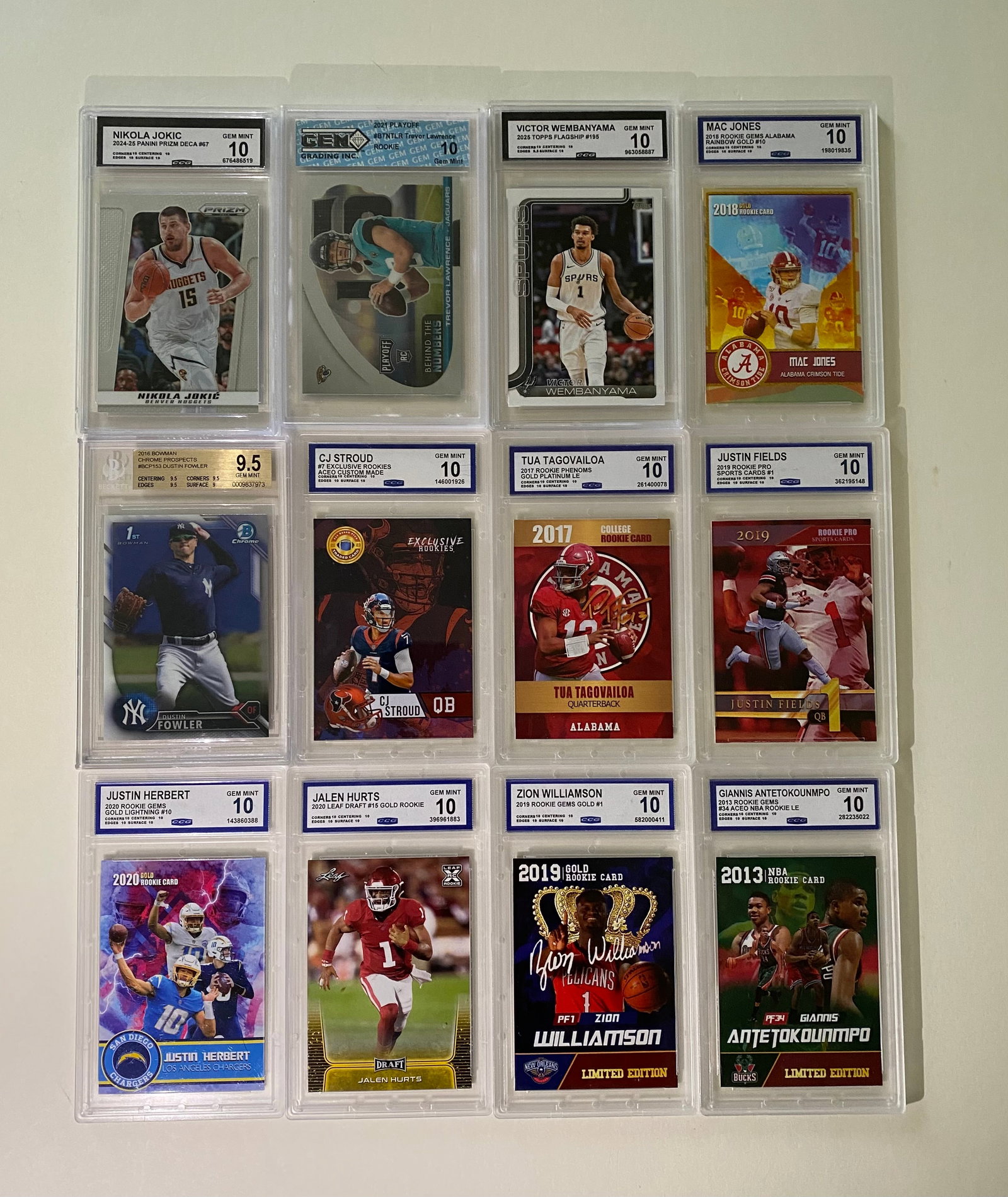 12 Graded Sports Cards Lot: Victor Wembanyama, Giannis, Jokic, C.J. Stroud (CCG/GMA 10s) (1 of 2)