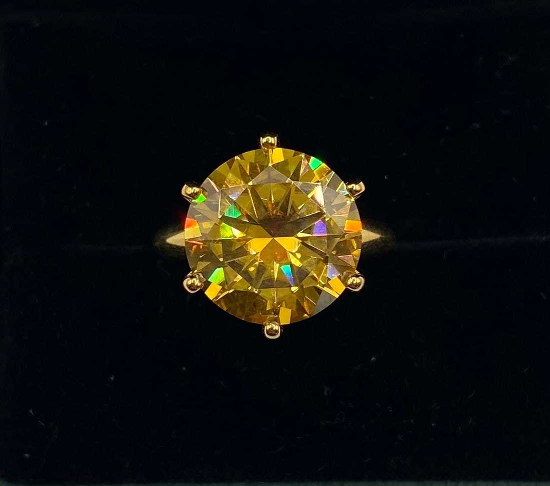 10 Carats VVS1 Moissanite Ring: 18k gold plated on sterling Silver Ring with 10 Carats Yellow Color VVS1 Moissanite Stone. It passes for diamond using diamond tester . It comes with a certificate
