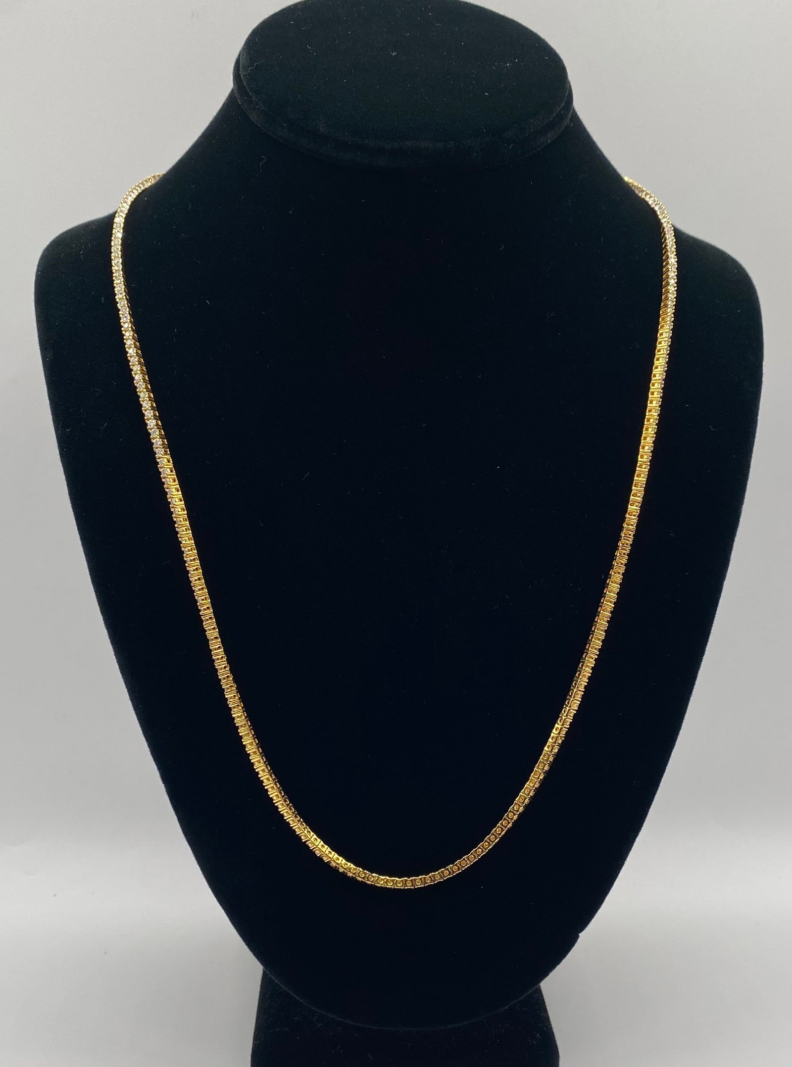 24 Inches Tennis VVS Moissanite Necklace: 18k gold plated on sterling Silver Necklace 2MM VVS1 Moissanite Stones. It passes for diamond using diamond tester . It comes with a certificate. necklace size: 24 inches
