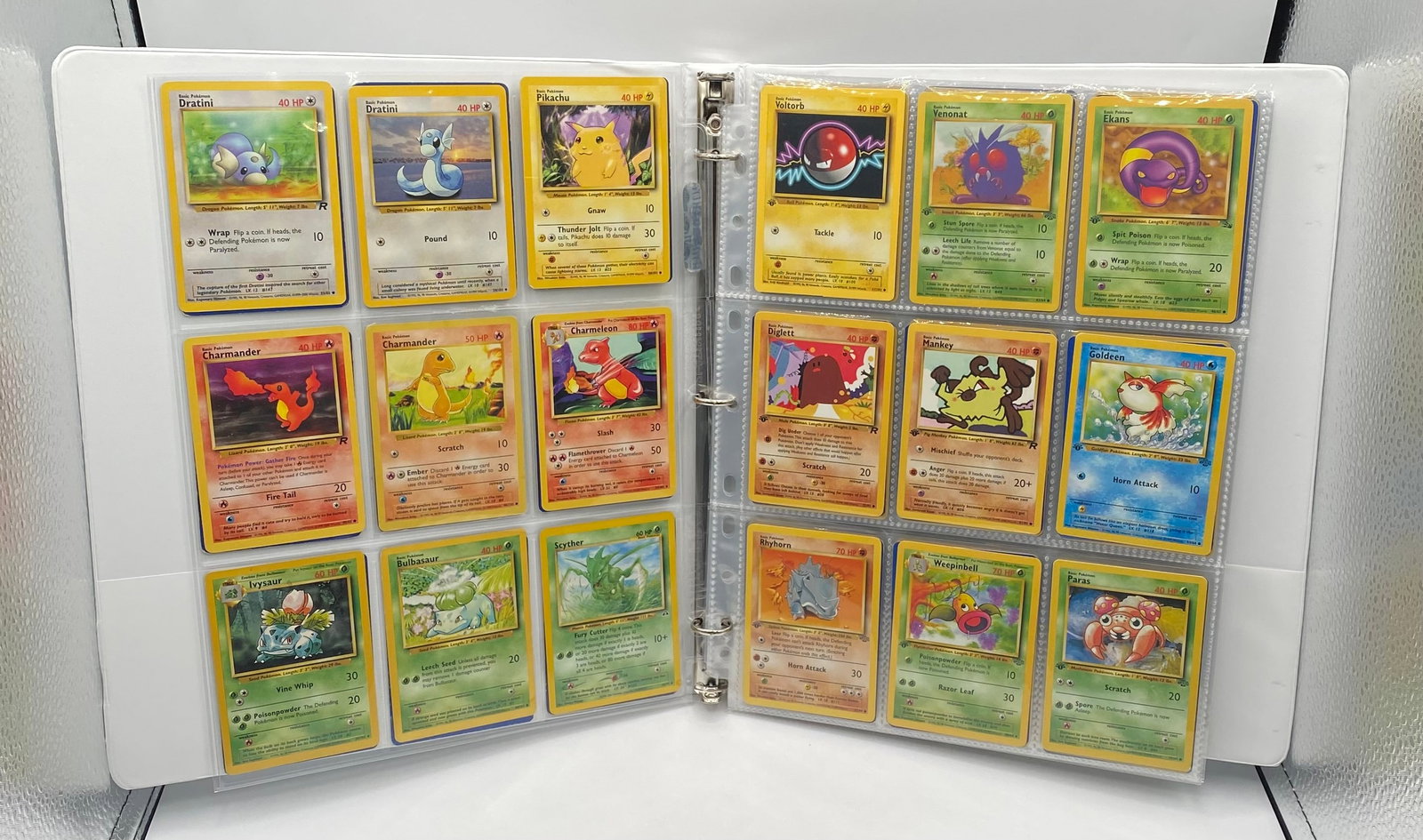 1999 1st Edition Pokemon & More Ivysaur, Voltorb, Dratini, Pikachu, Charmander & More: 1999 1st Edition Pokemon & More Ivysaur, Voltorb, Dratini, Pikachu, Charmander & More. Binder has over 200 1999 2000 Pokémon cards
