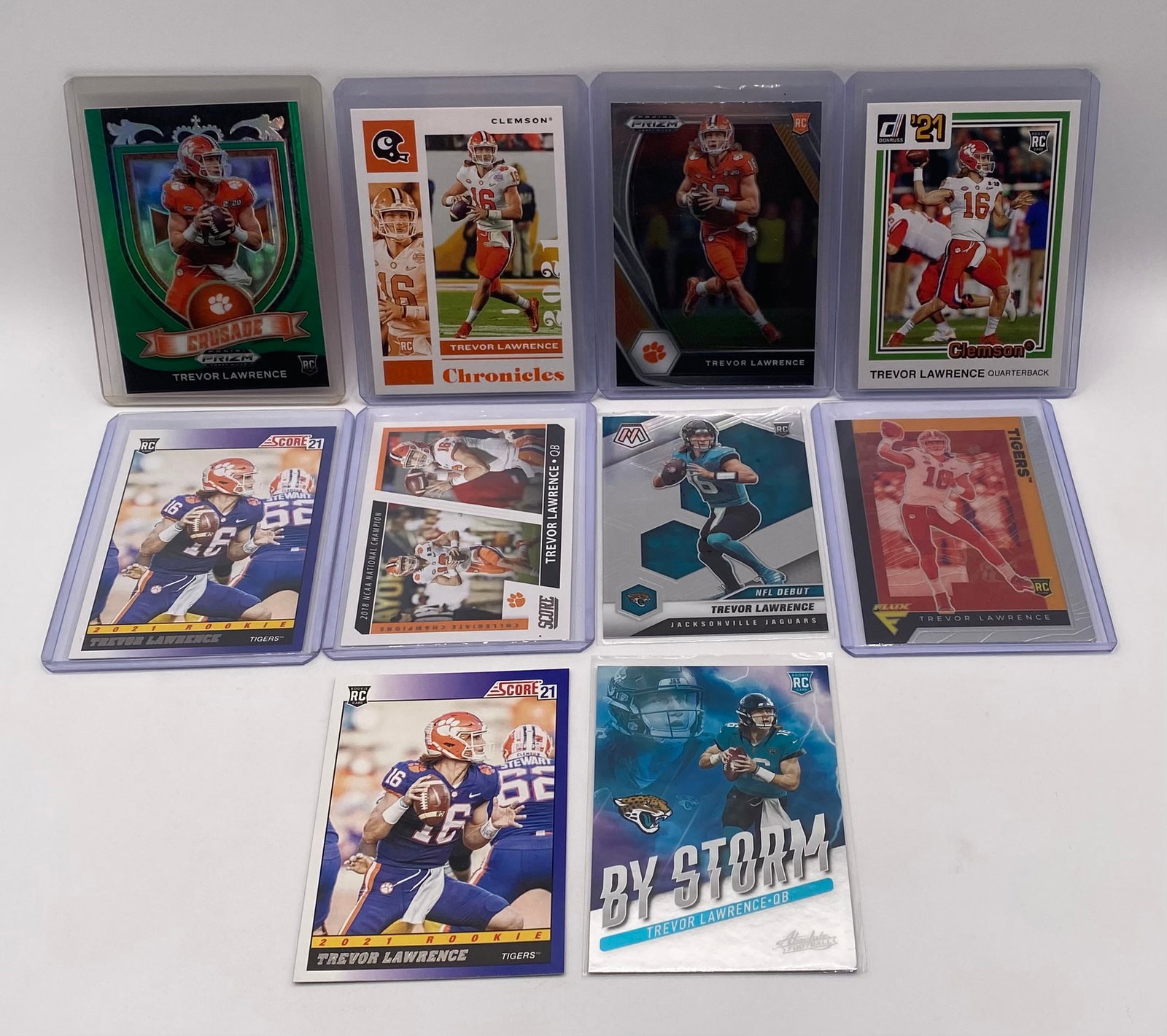 Trevor Lawrence Rookie Card Lot (10 Cards) – Includes Prizm Crusade, Mosaic, Score, Chronicles (1 of 1)