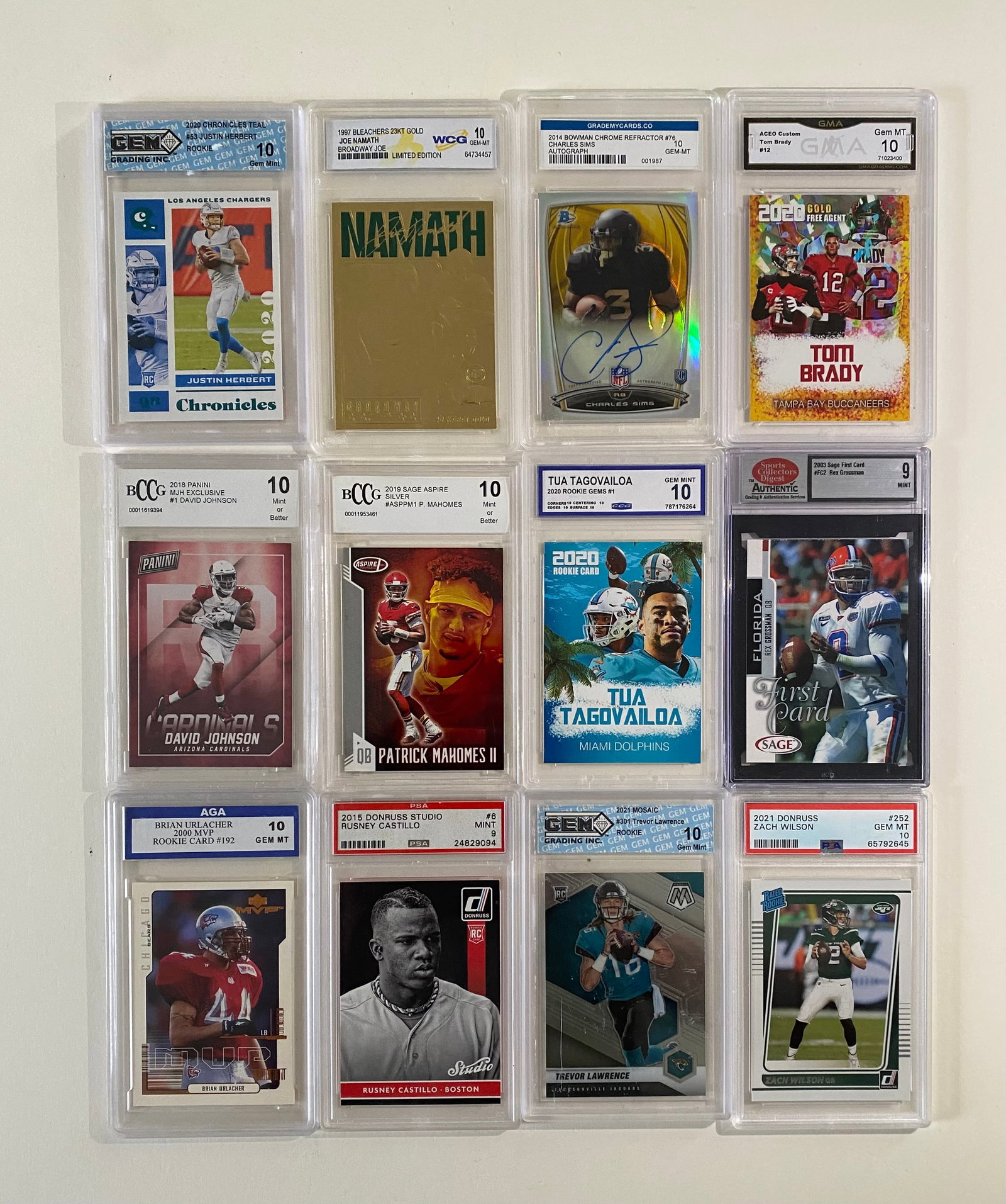 Patrick Mahomes, Tom Brady, Justin Herbert, Trevor Lawrence & More Lot: Lot of 12 Graded Sports Trading Cards - NFL & MLB Star QBs & Veterans (Mahomes, Brady, Herbert, Lawrence & More)