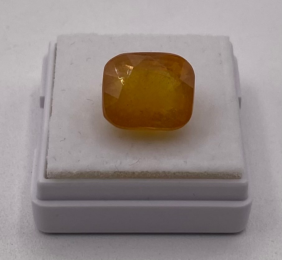 12.42 Cts Natural Yellow Sapphire: Variety: Natural Treated Sapphire Species / Group: Corundum Weight: 12.42 Cts Color: Yellow Shape / Cut: Cushion / Mixed Dimensions: 12.06 x 10.49 x 8.20 mm Refractive Index: 1.760 - 1.770 Biref