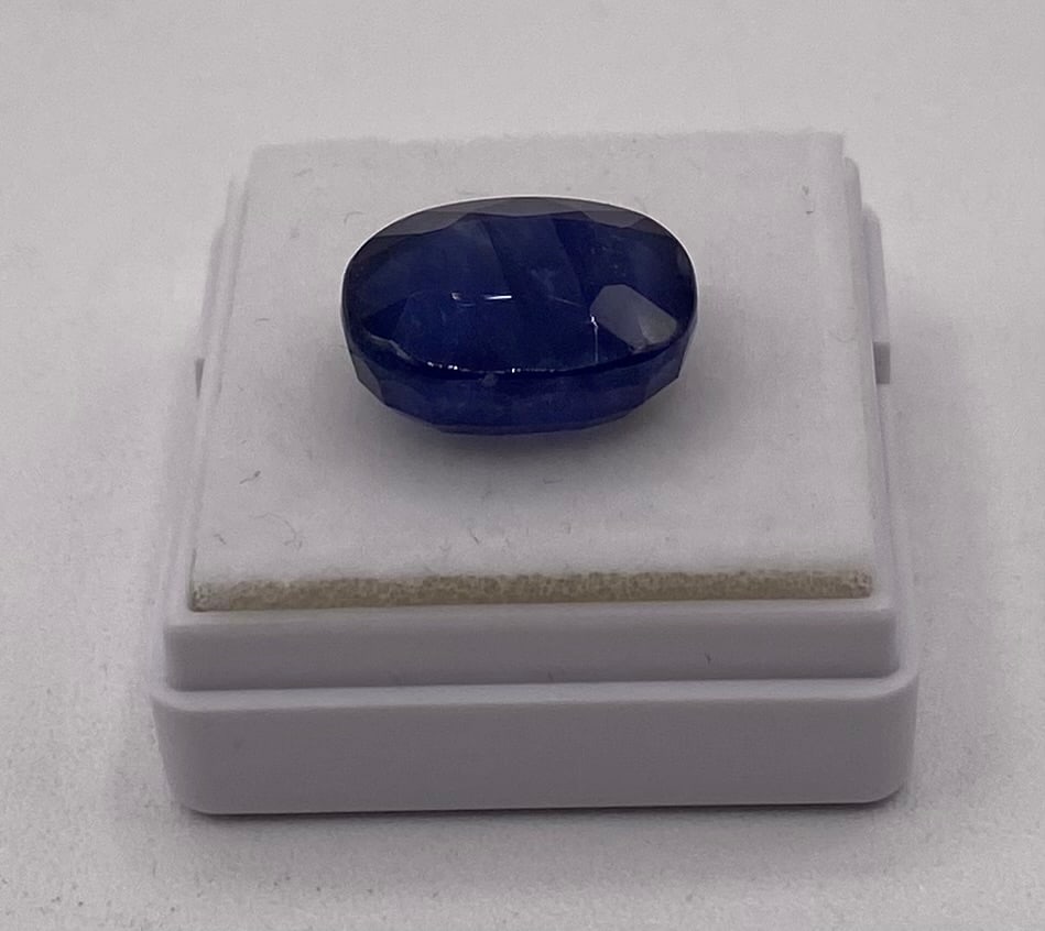 11.18 Ct Natural Blue Sapphire - Oval Mixed Cut Gemstone with Certificate: Variety: Natural Treated Sapphire Species / Group: Corundum Weight: 11.18 Cts Color: Blue Shape / Cut: Oval / Mixed Dimensions: 13.75 x 10.76 x 6.12 mmCertification: Comes complete with Gemmological