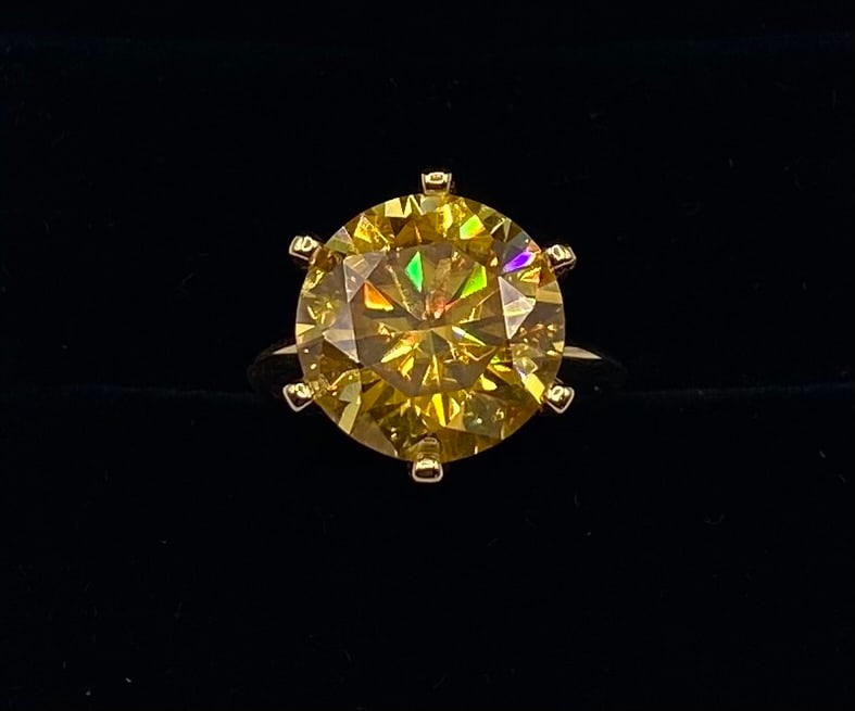 10 Carats Yellow Color VVS1 Moissanite Ring 18K Yellow Gold Plated Sterling Silver Ring: 10.00 CT Golden Yellow VVS1 Round Moissanite Statement Ring 18K Yellow Gold Plated Sterling Silver - Size 8 (W/ Certificate)Total Carat Weight: 10.00 CTW Main Stone: Genuine Moissanite Stone Clarity:
