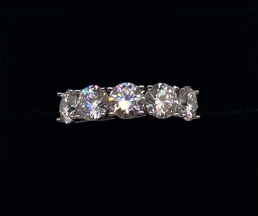 5 Carats VVS1 Moissanite Ring 18K Gold Plated Sterling Silver Ring Size 7: 5 CT D VVS1 Round Moissanite Statement Ring 18K Gold Plated Sterling Silver - Size 7 W/ Certificate)Total Carat Weight: 5 CTW Main Stone: Genuine Moissanite Stone Clarity: VVS1 Color D Color Stone