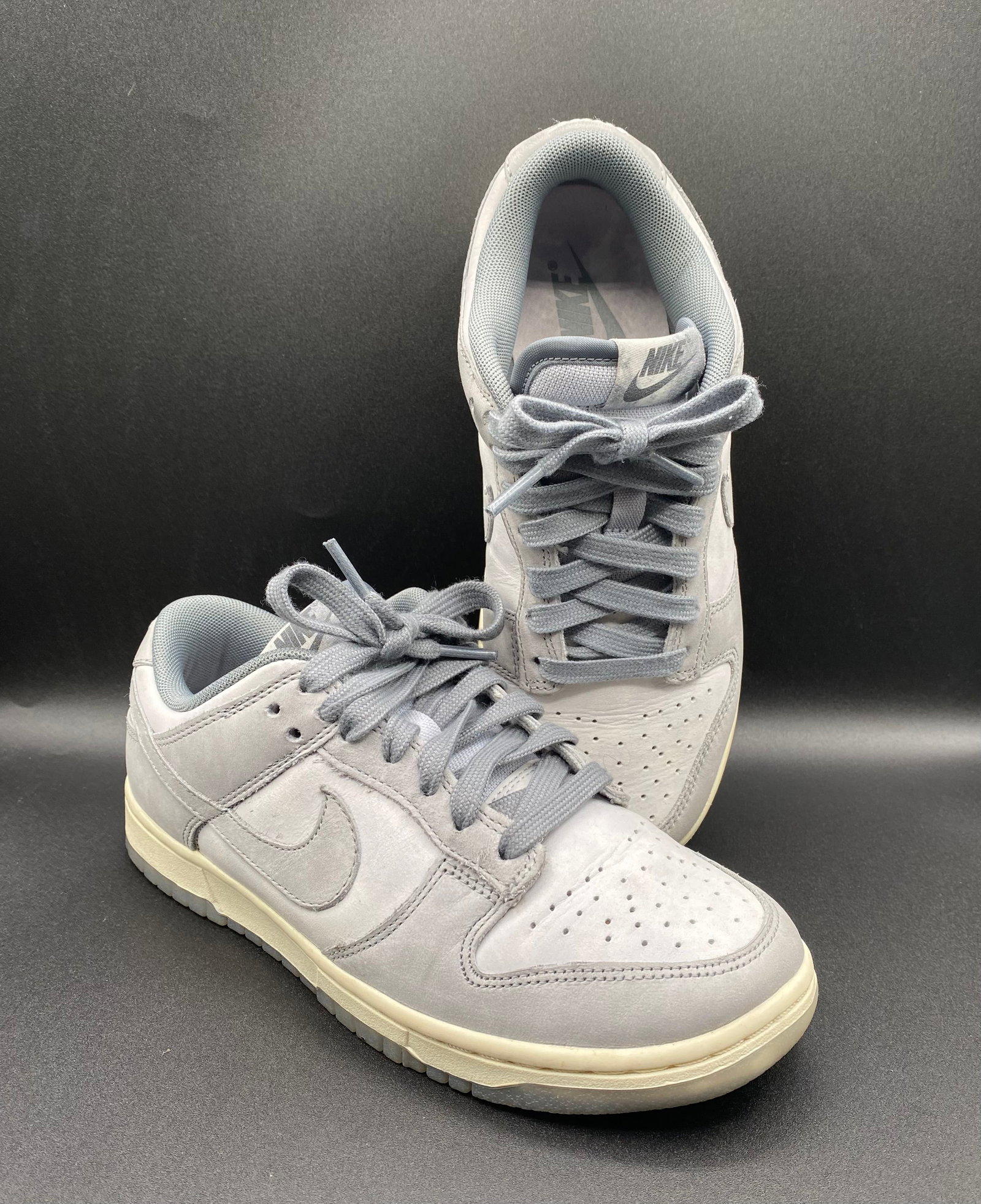 Nike Dunk Low Premium "Cool Grey / Football Grey" Nubuck Sneakers: Up for auction is a premium pair of Nike Dunk Low Sneakers in the sophisticated "Cool Grey / Football Grey" colorway (Style # FV1167-001). Crafted with soft nubuck leather uppers, matching tonal Swoos