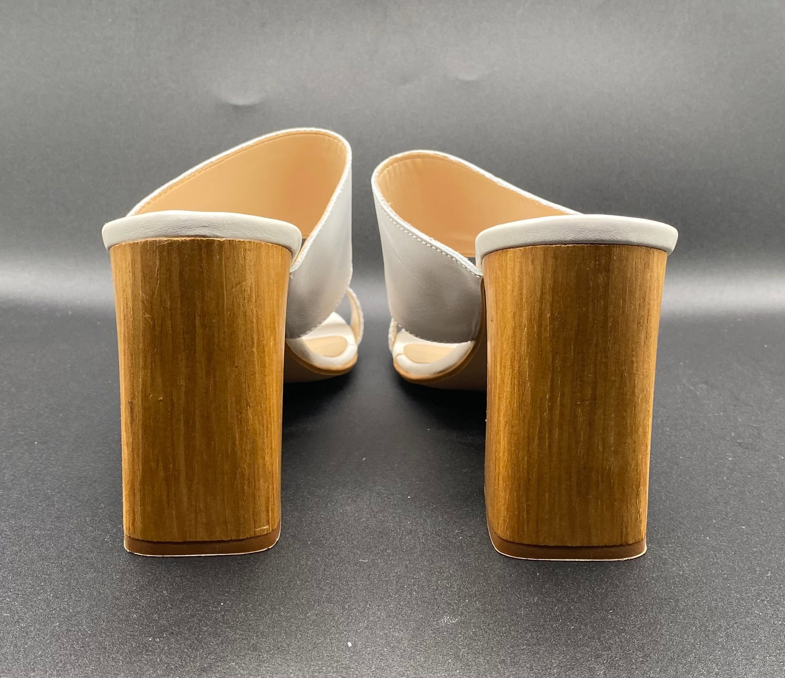 Aldo "Treiwen" Off-White Leather Double-Strap Block Heel Mules: Up for auction is a chic pair of Aldo "Treiwen" Open-Toe Block Heel Mules in smooth off-white leather. Features a minimalist double-strap upper, backless slip-on silhouette, square open toe, and sturd