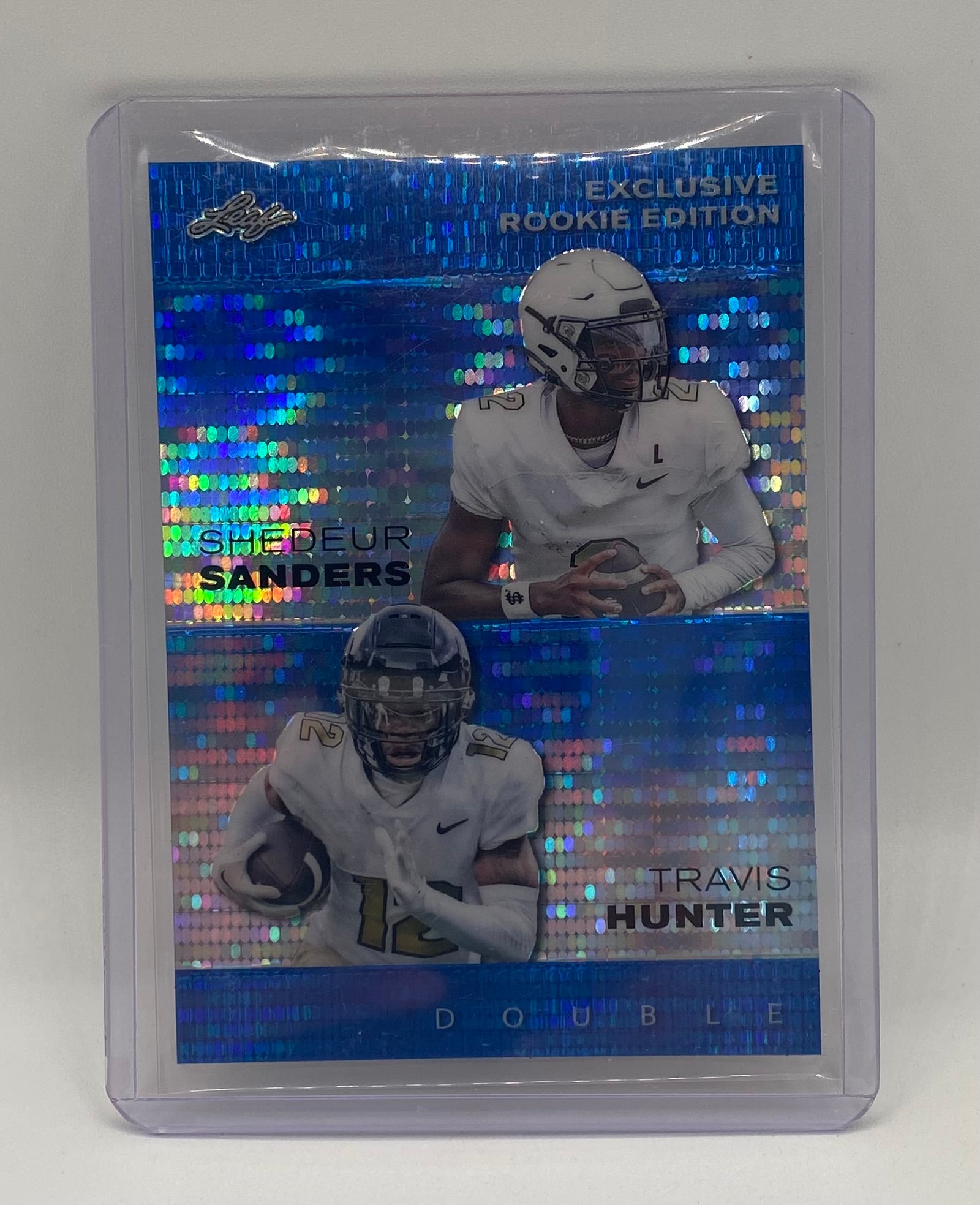 Shedeur Sanders & Travis Hunter Holo /20: 2024 Leaf Exclusive Rookie Edition Dual Card - Shedeur Sanders & Travis Hunter Blue Holo /20