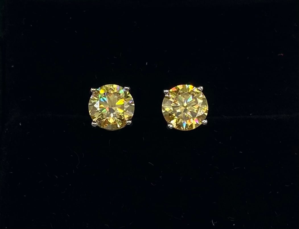 4.00 Carats Yellow Color VVS1 Moissanite Earrings Certified: Total Carat Weight: 4.00 CTW (2.00 Carats per stone) Stone Type: Lab-Created Moissanite (Passes Thermal/Diamond Tester) Color Grade: Lemon Yellow Clarity Grade: VVS1 Metal Composition: 18K Gold Plated