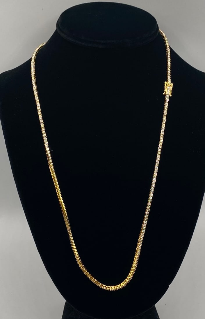 Tennis VVS 24 Inches Necklace: 18k Yellow Gold Plated On sterling Silver with Moissanite VVS1 Color D . It comes with certificate. 24 inches length.