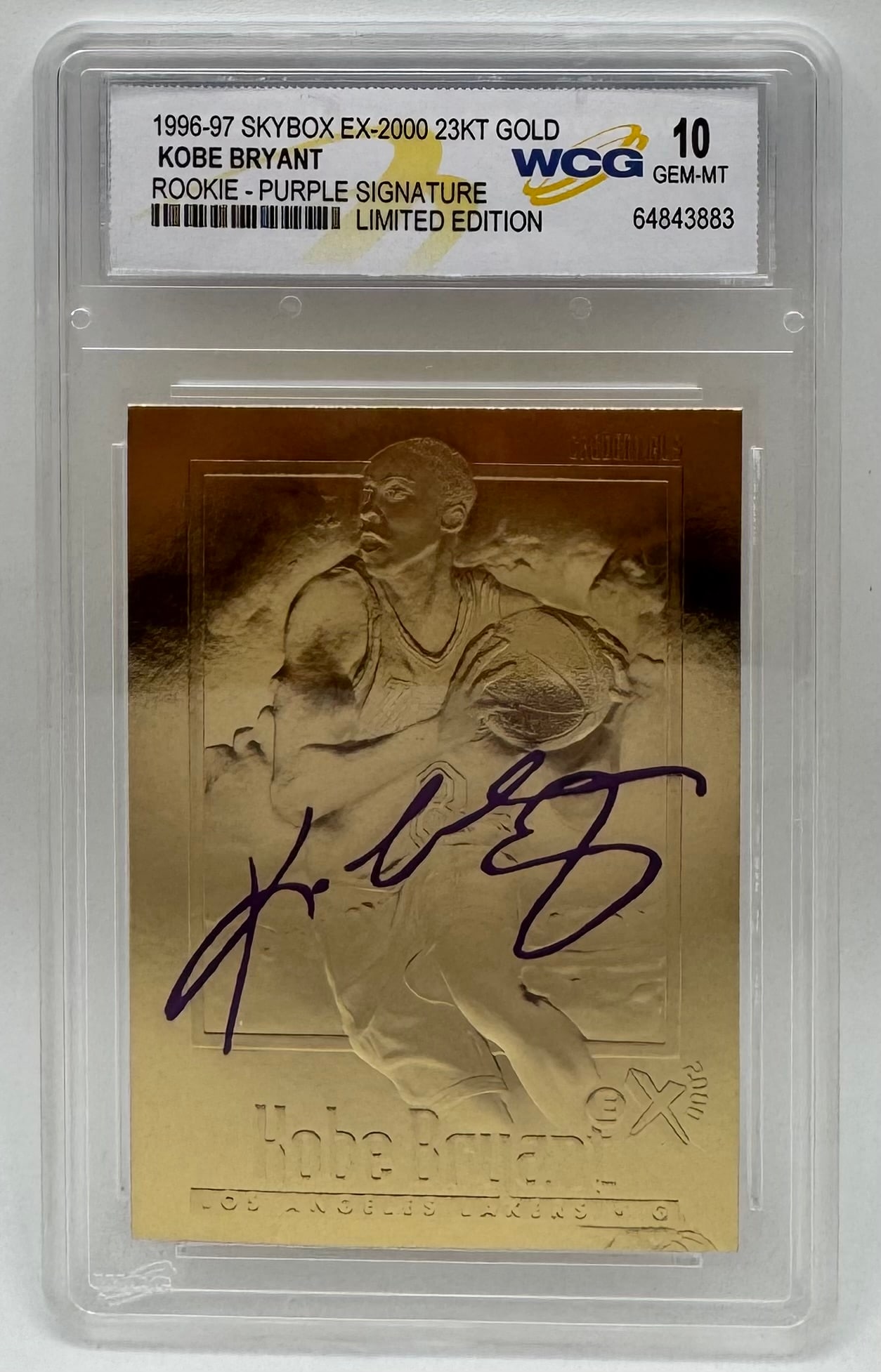 Kobe Bryant 1996-97 SkyBox EX-2000 23KT Gold Rookie: Highlighting Lakers legend Kobe Bryant’s rookie era, this 1996-97 SkyBox EX-2000 23KT Gold Limited Edition trading card features a vivid purple facsimile signature overlay across a gold-sculpted