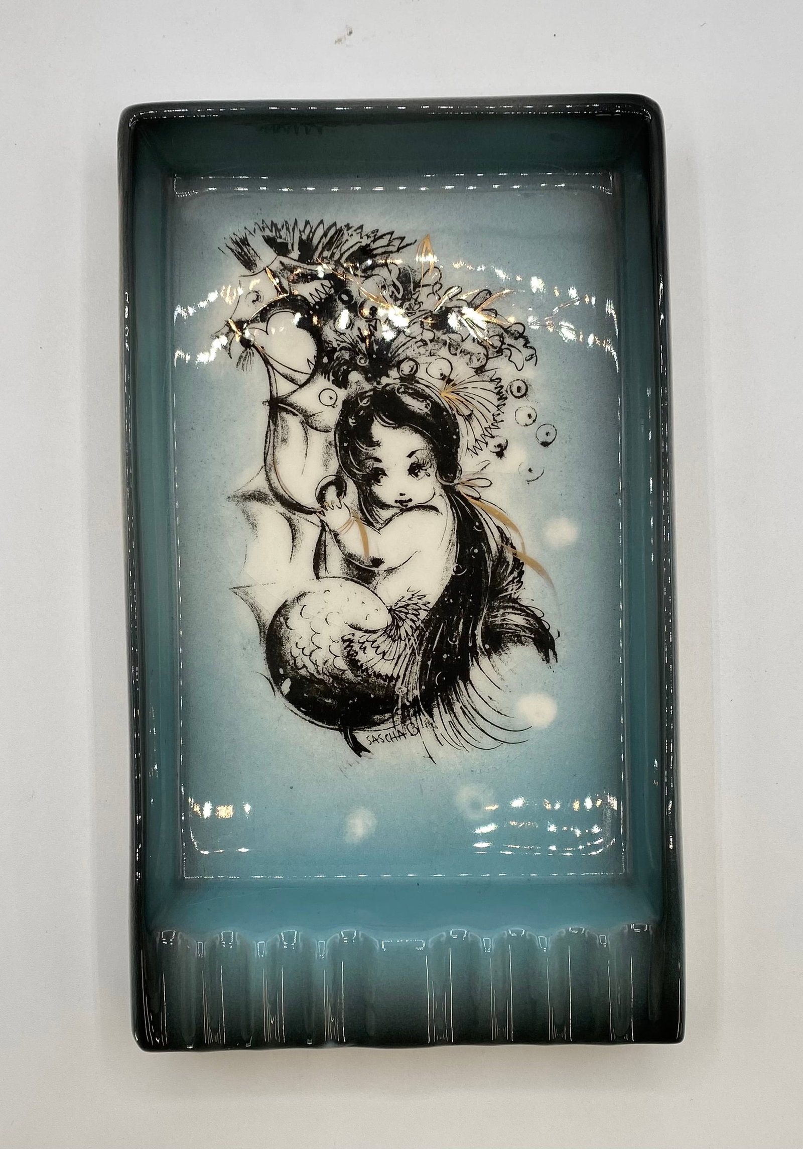 Mid-Century Modern Sascha Brastoff Mermaid Rectangular Ceramic Ashtray Tray: A collectible Mid-Century Modern California art pottery rectangular ashtray/trinket tray by Sascha Brastoff, featuring a whimsical hand-painted mermaid and seahorse illustration with fine metallic gol
