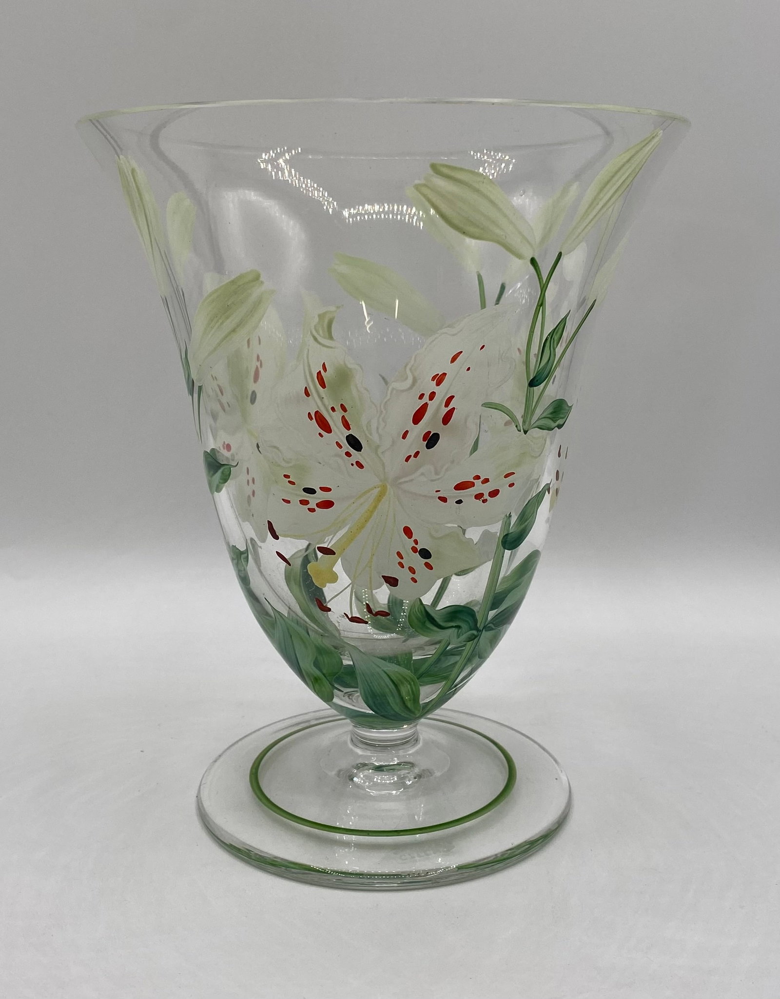 Vintage Hand-Painted Czechoslovakian Glass Footed Lily Vase: Up for auction is a vintage Bohemian / Czechoslovakian art glass footed vase featuring hand-painted tiger lily blooms with red speckled centers, green stems, and foliage. Designed with a wide flared r