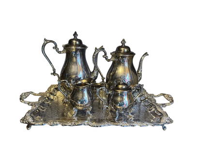 Vintage Sheridan Silver on Copper Tea Set: Vintage Sheridan silver on copper 6 pc coffee and tea set with a creamer, sugar, and butler tray. DIMENSIONS: Tray- 24.75"W x 15.75"D x 2"H Tea Pot- 10.5"W x 6"D x 11.75"H Coffee Pot- 10"W x 6"D x 10.
