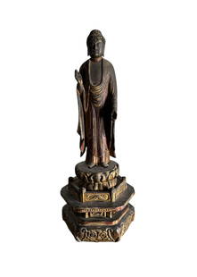Antique Carved Wood Thai Buddha: An antique carved wood Thai Buddha. DIMENSIONS: 5â€W x 4â€D x 12â€H. CONDITION: Excellent. No Reserve.