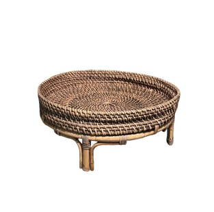 Vintage Rattan Footed Tray: A vintage rattan footed tray. DIMENSIONS: 20"W x 20"D x 8"H. CONDITION: Good. Needs a little cleaning.