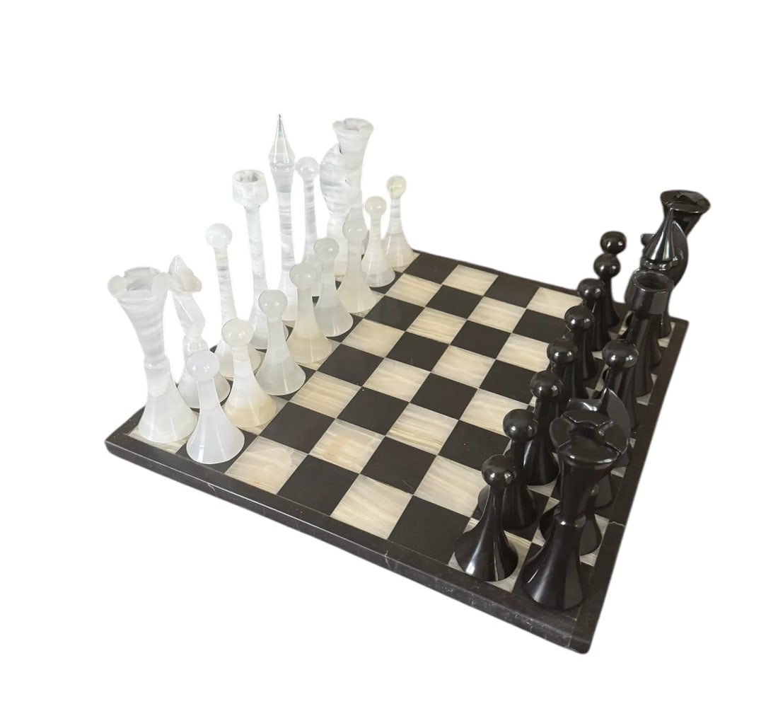 An exceptional vintage onyx and quartz chess set: An exceptional vintage onyx and quartz chess set. DIMENSIONS: 13"W x 14"Dx 0.75"H
