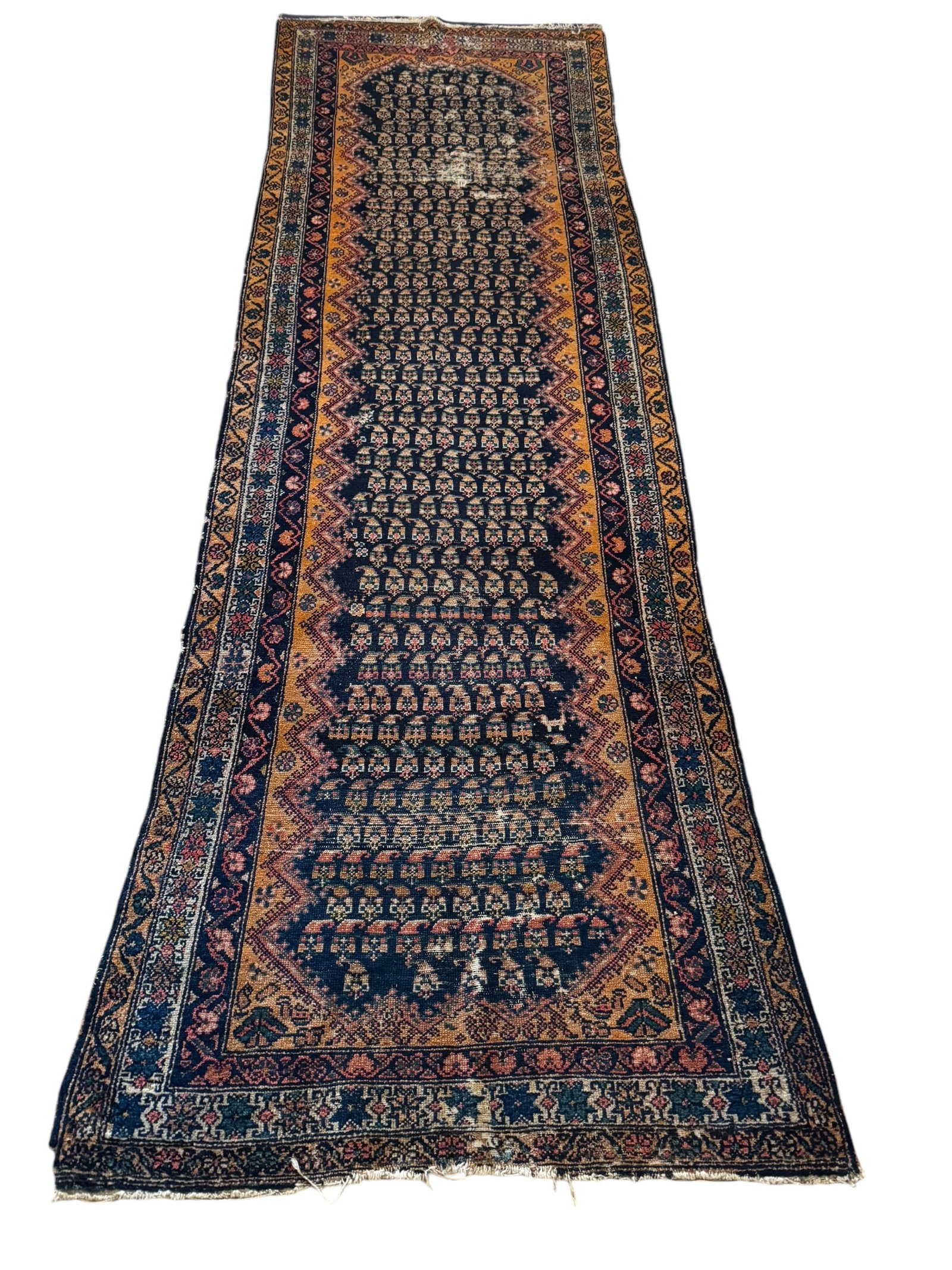 An antique blue and orange Caucasian runner: An antique blue and orange Caucasian runner. DIMENSIONS: 40.5"W x 124"L