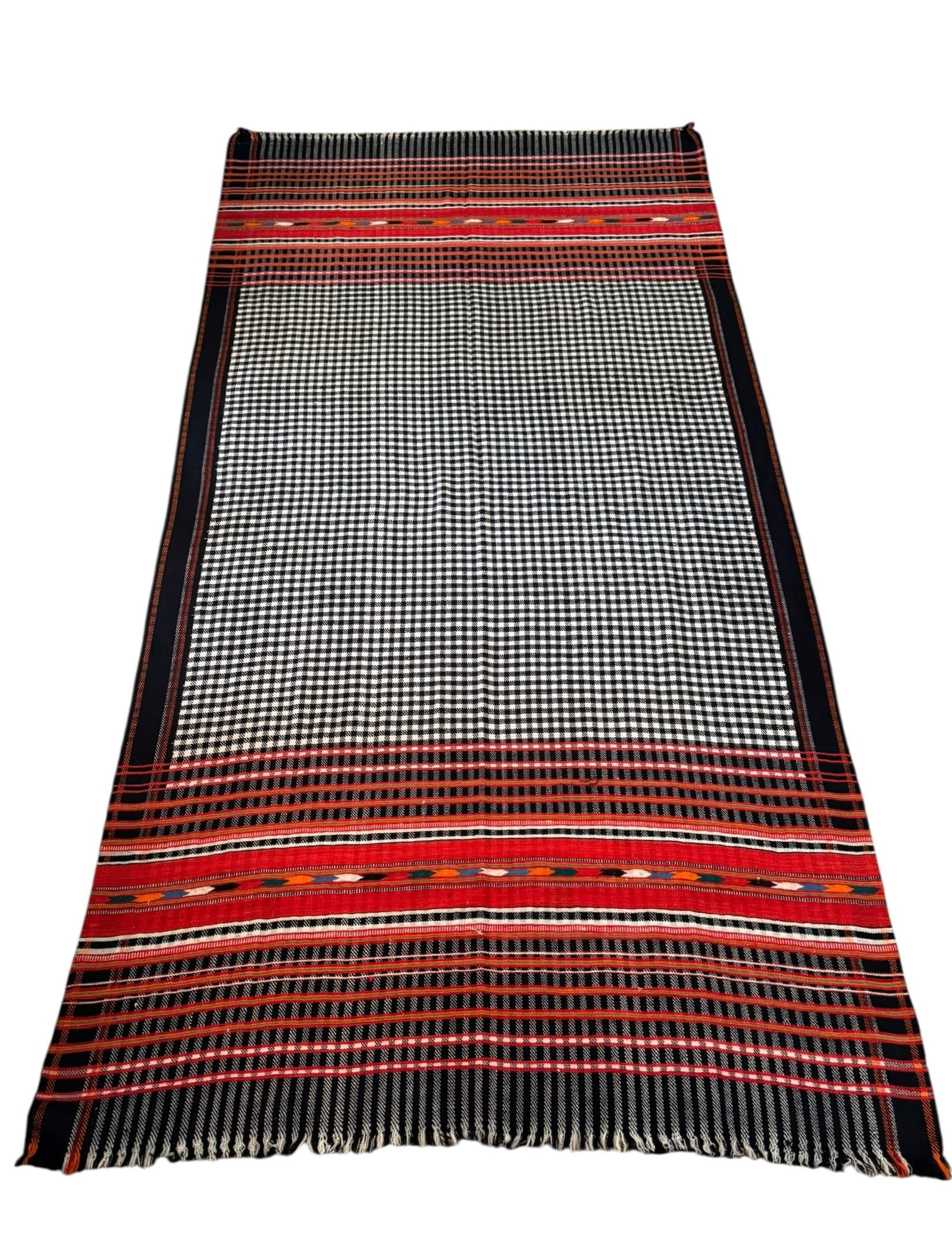Black and white checkered wool Rajasthani blanket: Black and white checkered wool Rajasthani blanket. DIMENSIONS: 48.5”W x 98.5”L
