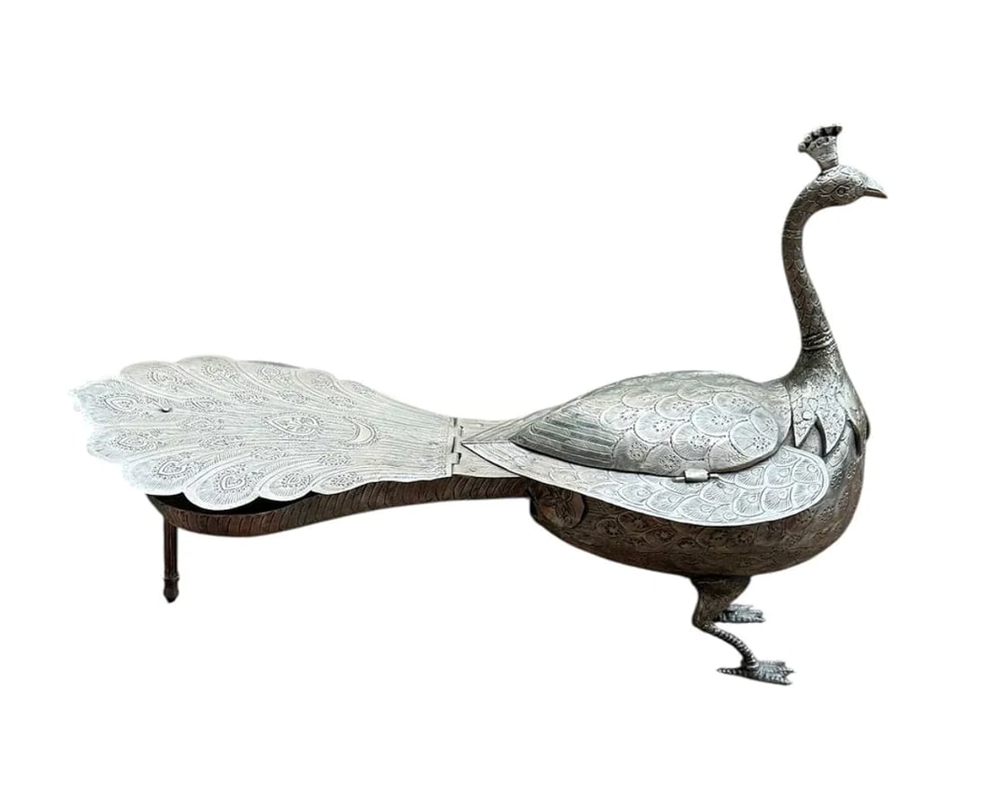 An Indian silver peacock chutney serving dish: An Indian silver peacock chutney serving dish. DIMENSIONS: 16"L x 7"D x 11"H