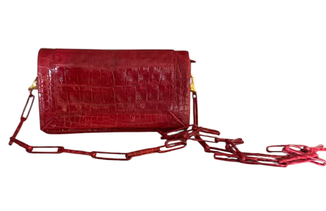 Nancy Gonzalez red croc clutch with cross body strap: Nancy Gonzalez red croc clutch with cross body strap.