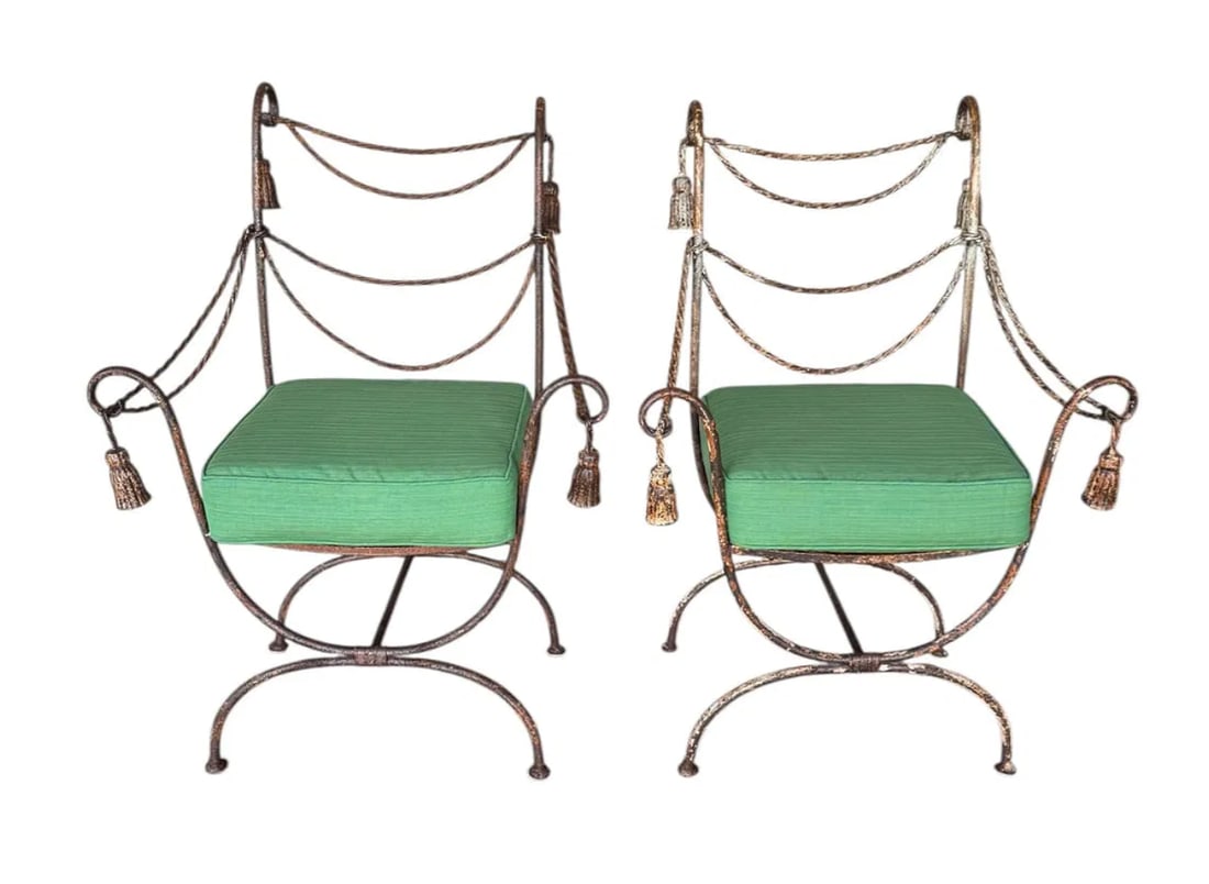 A pair of exquisite Regency iron tassel chairs with custom cushions in an outdoor fabric: A pair of exquisite Regency iron tassel chairs with custom cushions in an outdoor fabric. DIMENSIONS: 29"W x 18"D x 41"H