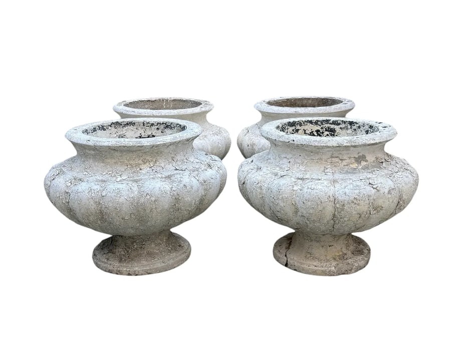 A rare set of four antique stone marshmallow planters: A rare set of four antique stone marshmallow planters. DIMENSIONS: 16.5"D x 13.5"H