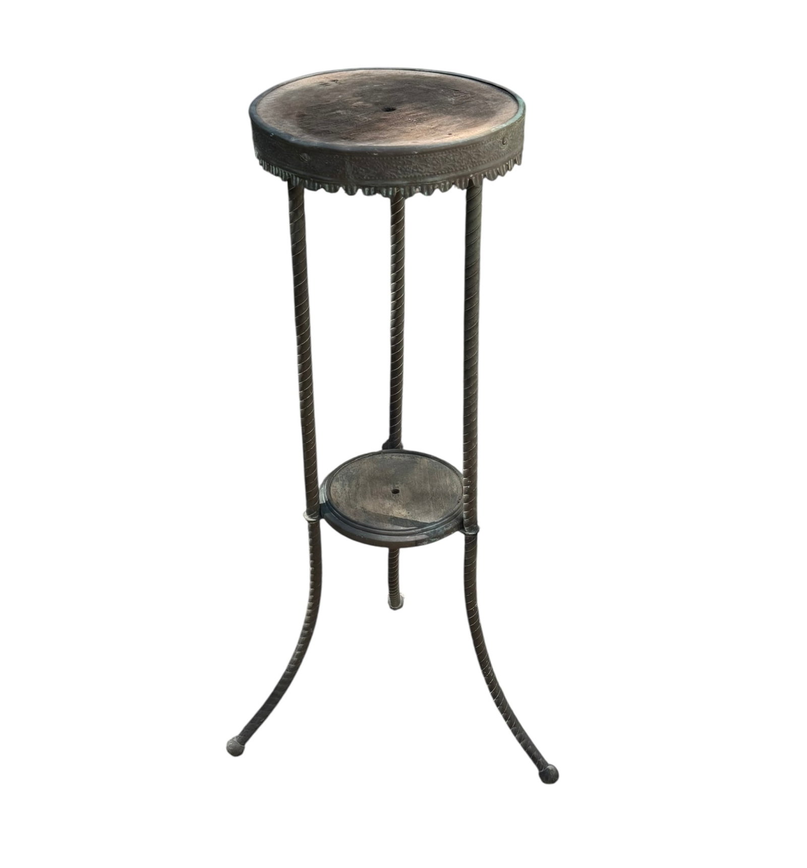 Vintage tiered wood table with metal detailing: A vintage circular tiered wood table with beautiful braided metal legs and surrounding detail