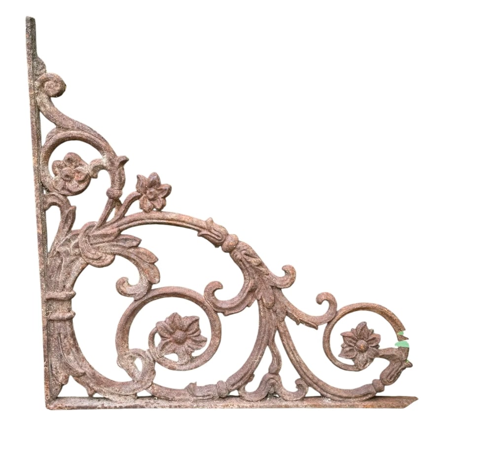 A set of four wrought iron L-shaped brackets with a floral motif (1 of 5)