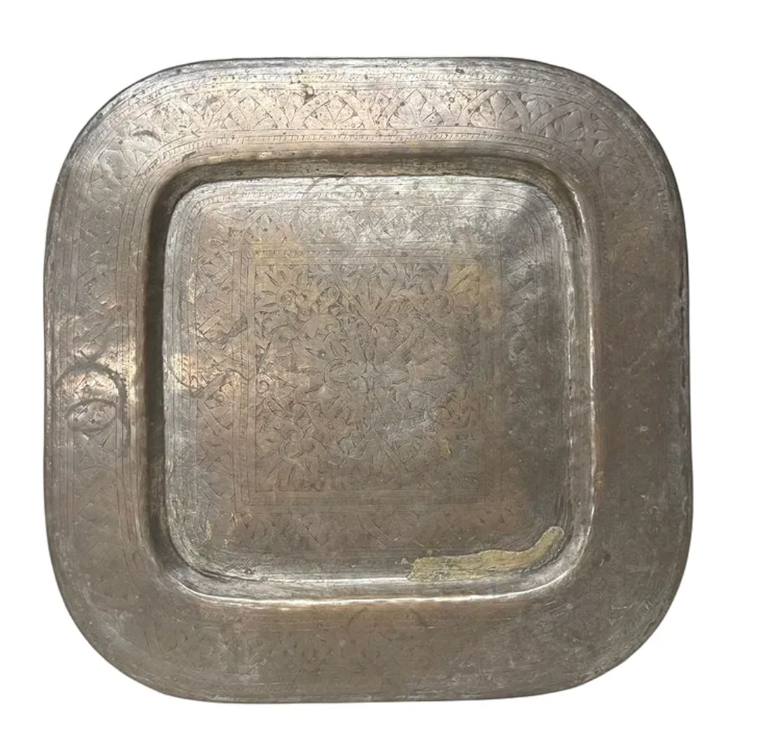 An antique Indian engraved silver tray: An antique Indian engraved silver tray. DIMENSIONS: 24"W x 24"D x 0.75"H