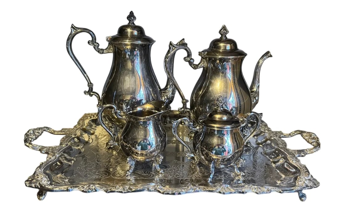 Vintage Sheridan silver on copper 6 pc coffee and tea set with a creamer, sugar, and butler tray: Vintage Sheridan silver on copper 6 pc coffee and tea set with a creamer, sugar, and butler tray. DIMENSIONS: Tray- 24.75"W x 15.75"D x 2"H Tea Pot- 10.5"W x 6"D x 11.75"H Coffee Pot- 10"W x 6"D x 10.