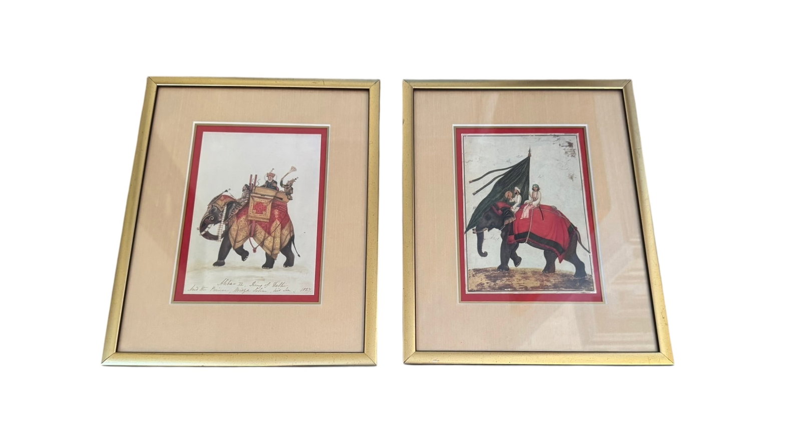 Pair of framed elephant prints: Pair of framed elephant prints. DIMENSIONS: 10.5"W x 13"H