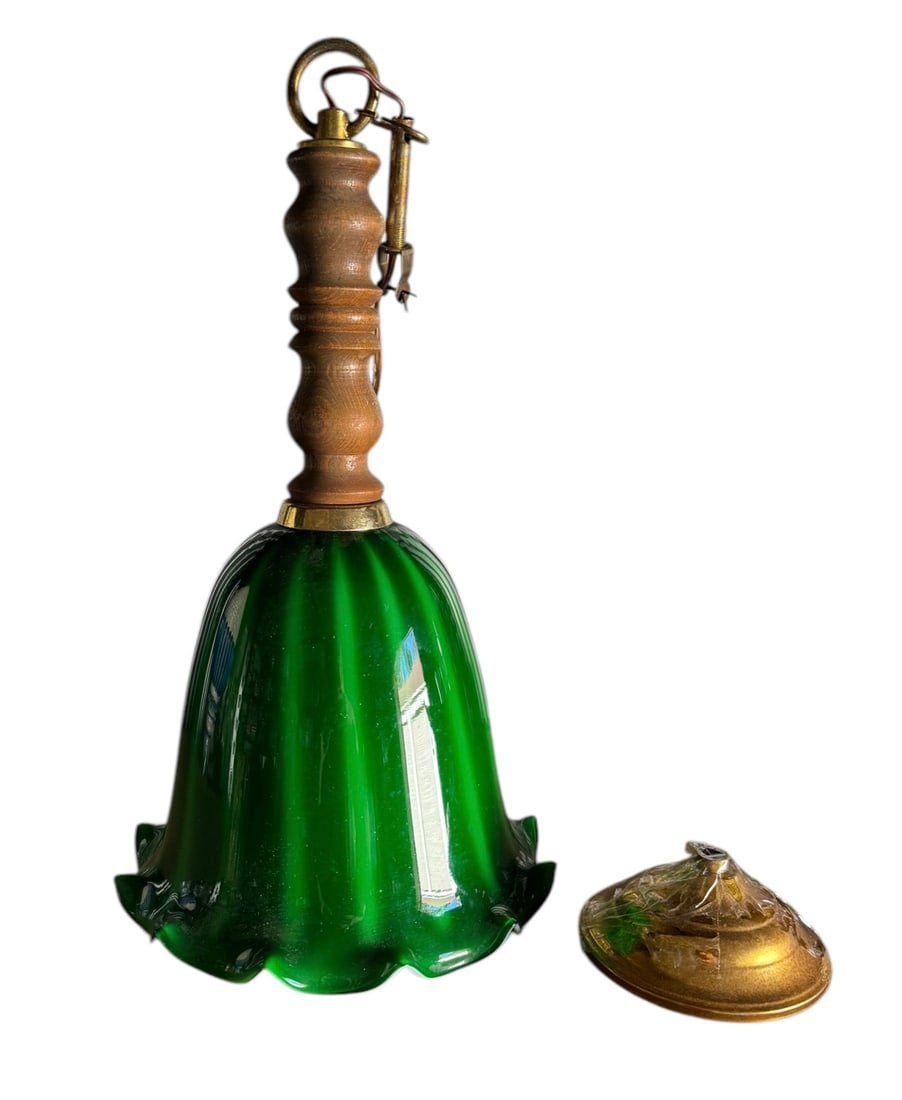 Vintage green glass flower pendant: A vintage green glass flower pendant with a carved wood stem. DIMENSIONS: 8.5"W x 8.5"D x 16.25"H