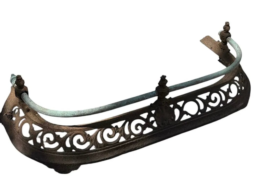 An antique copper and iron fire fender: An antique copper and iron fire fender. DIMENSIONS: 30"L x 12"D x 8"H