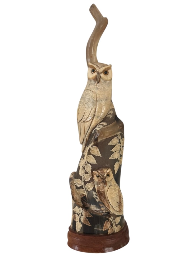 Vintage buffalo horn carved owl: Vintage buffalo horn carved owl. DIMENSIONS: 3.75"W x 2.25"D x 12"H