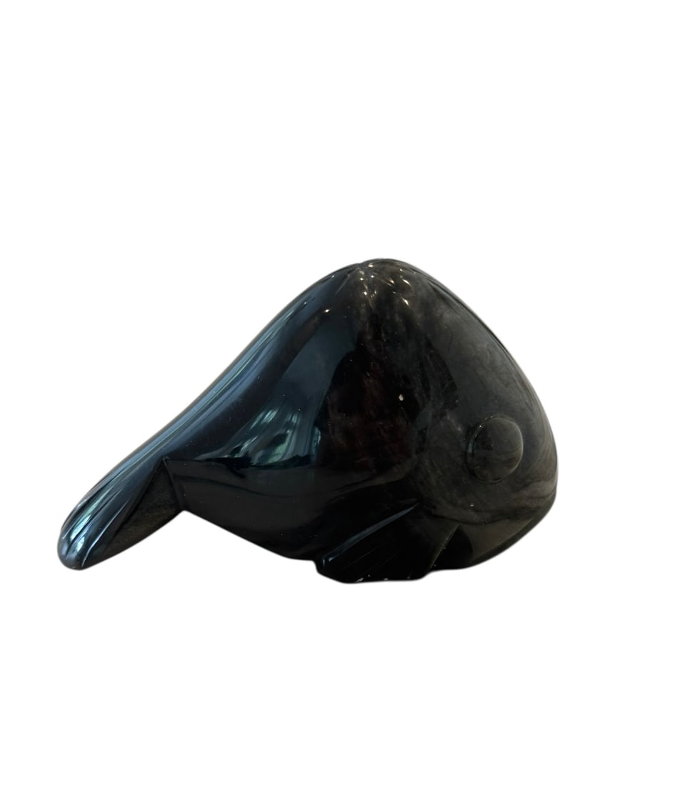 Carved obisidian whale statue: Carved obisidian whale statue. DIMENSIONS: 4.5" x 1.75" x 3.25"