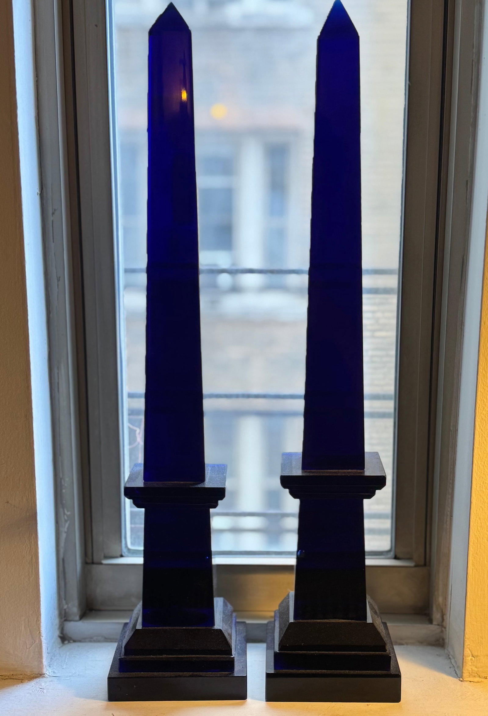 Pair of antique cobalt glass obelisks: Pair of antique cobalt glass obelisks. DIMENSIONS: 4.5"W x 4.5"D x 21.75"H