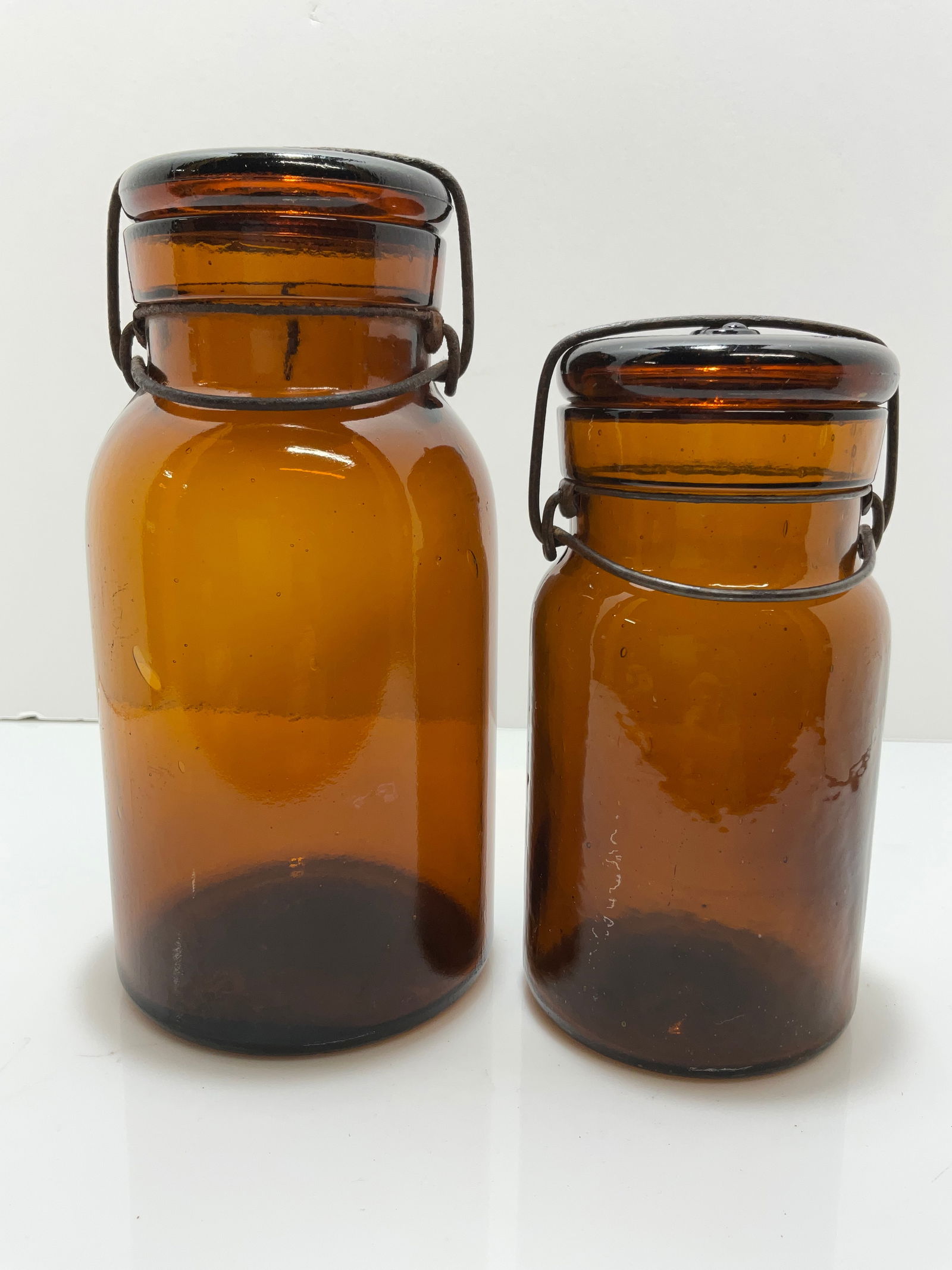 Two Amber, Lightning Base-Embossed Only Fruit Jars. Quart and Pint. (1 of 6)
