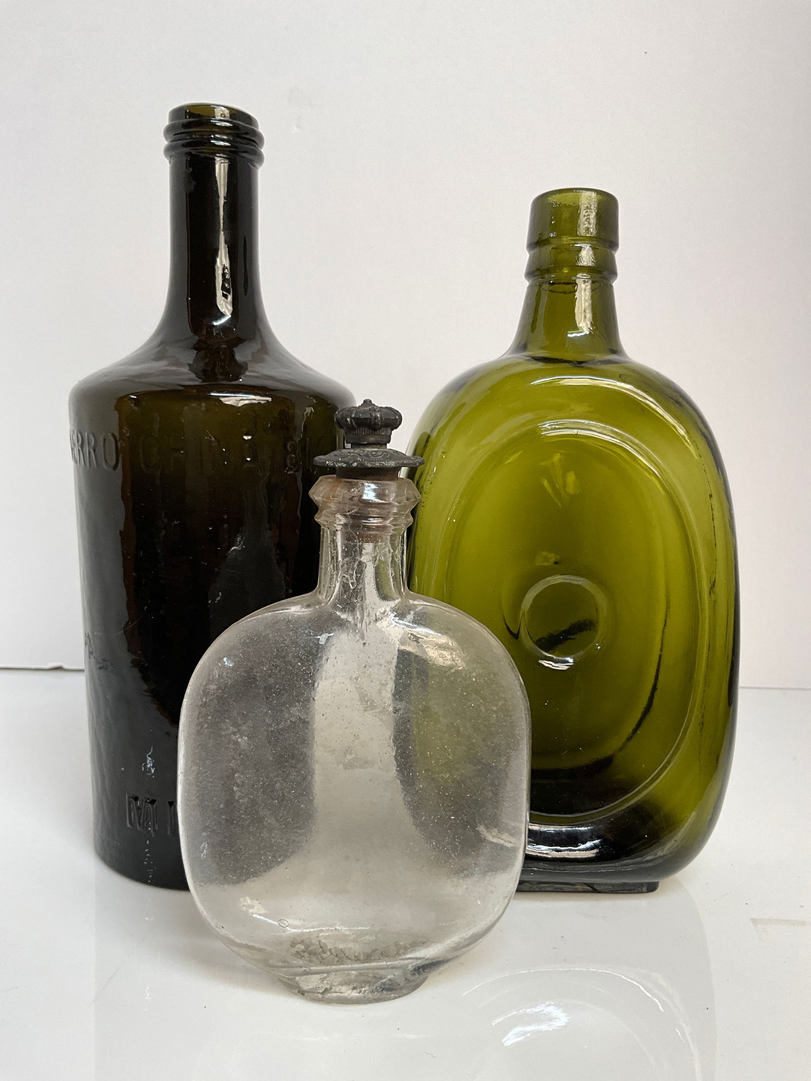 A lot of three bottles, two Italian bottles, and one pumpkin seed (1 of 6)