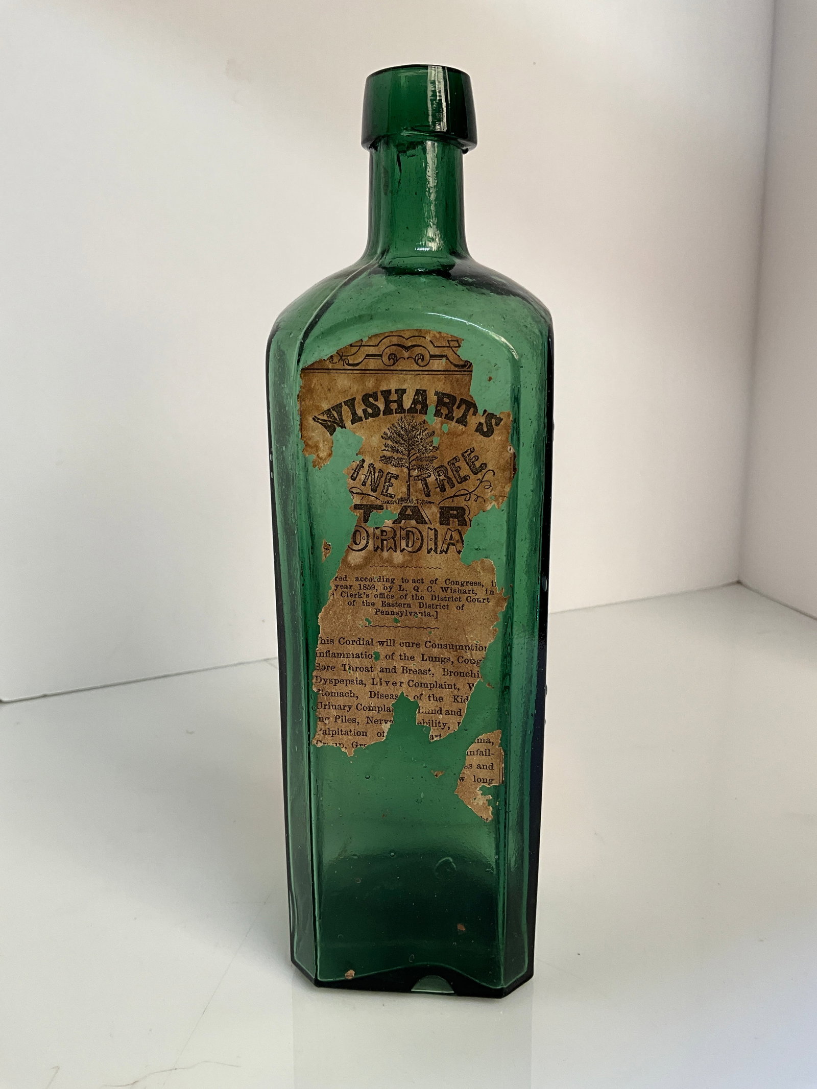 Wishart's Pine Tree Cordial with partial label, Green in color, Patent 1859 (1 of 9)