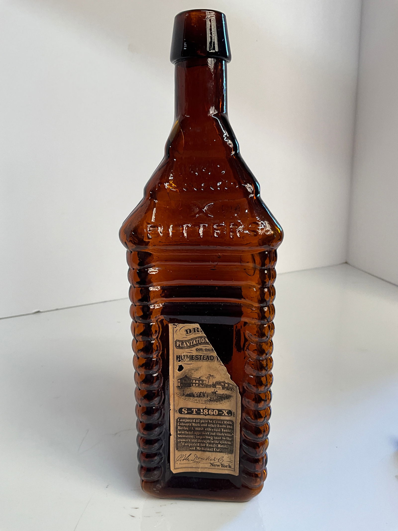Drakes Plantation Bitters, with partial label 80% (1 of 8)