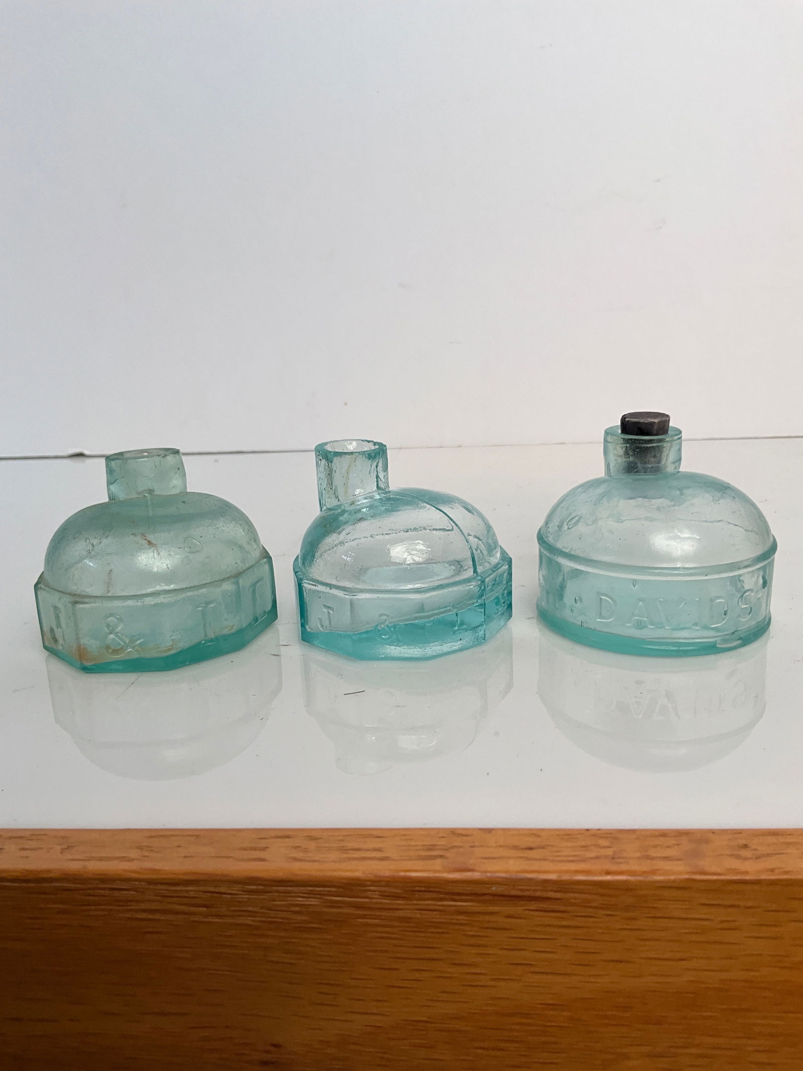 3 inks, two J & IEM and one Davids: 3 inks, two J & IEM and one Davids One of the J & IEM is dug but with no damage. The other J & IEM has a sheared 7 ground lip but probably the best embossing I've seen. Never been in the ground.The la