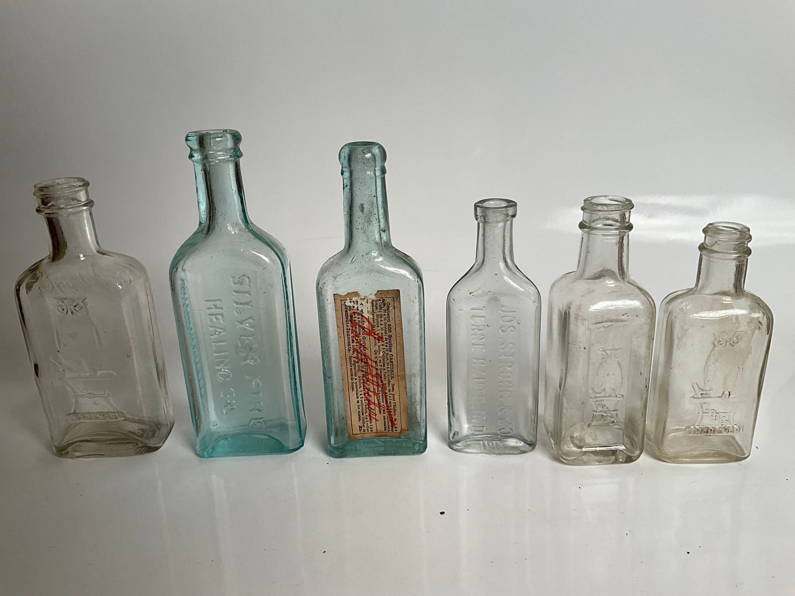 Lot of six medicine bottles, three towel, drugstore medicines, one silver pine, and one Castoria (1 of 5)