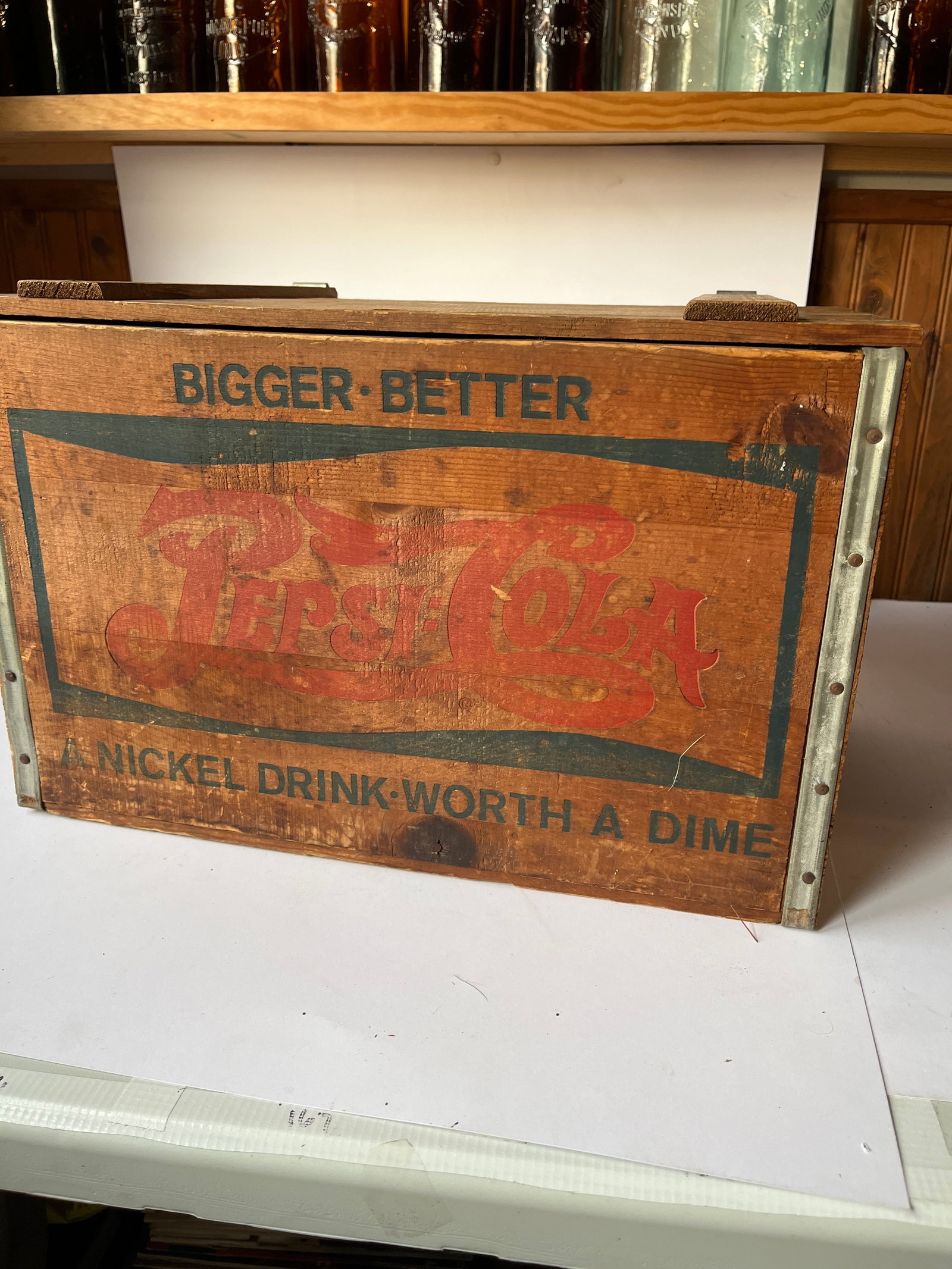 PEPSI-COLA wooden crate w/ metal straps.: PEPSI-COLA wooden crate w/ metal straps. Nice graphics. A little faded on front but no damage. 18" X 12" X 12".