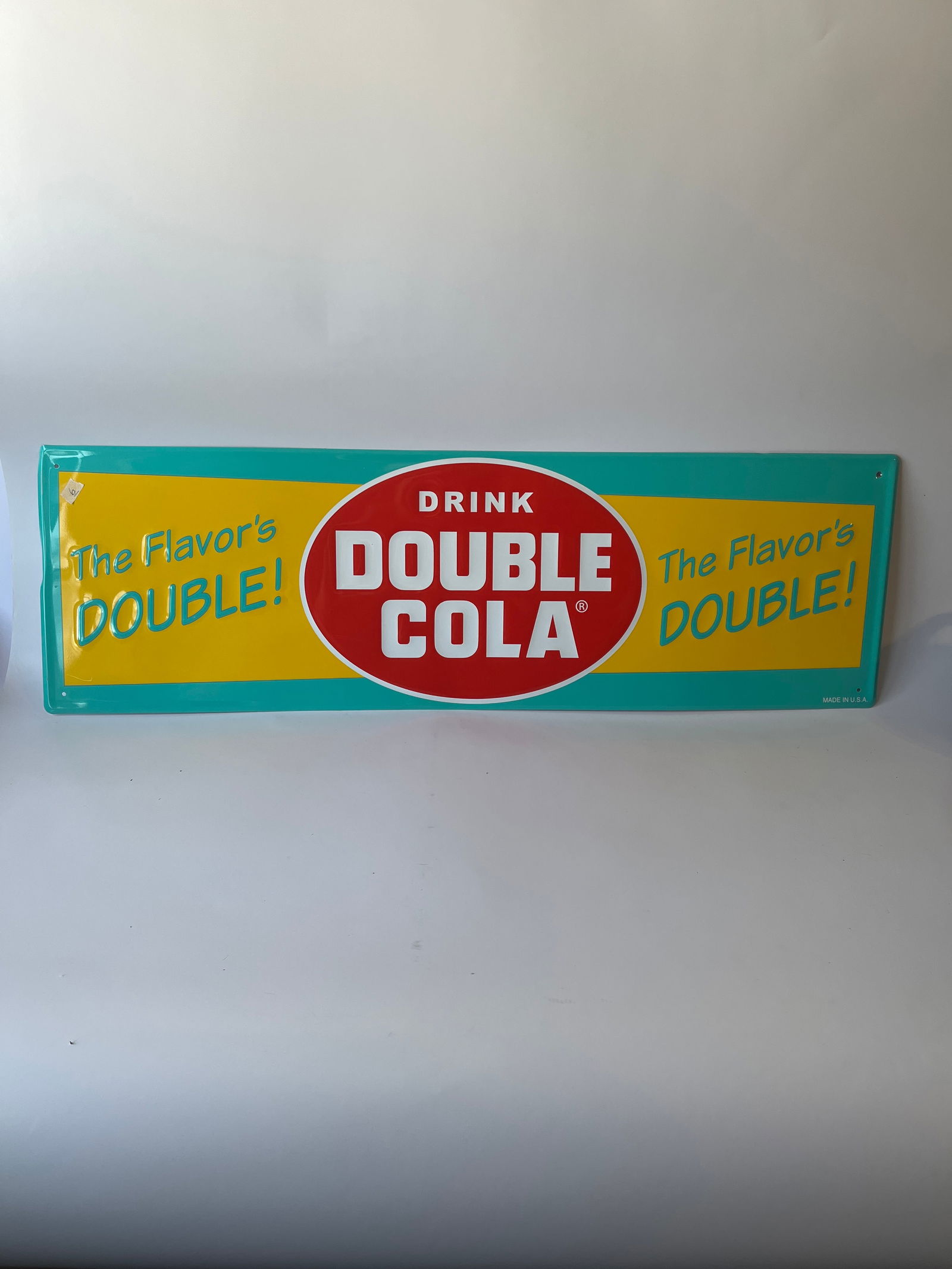Drink Double Cola embossed metal sign. Measures 13" X 42". (1 of 5)