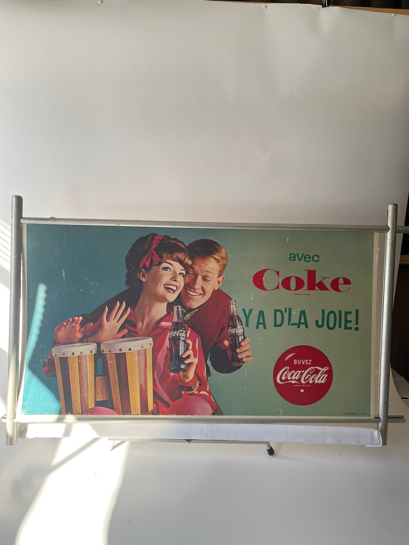 Avec Coke Ya D'la Joie! cardboard sign in original frame. 20" X 38".: Avec Coke Ya D'la Joie! cardboard sign in original frame. 20" X 38". French Canadian.