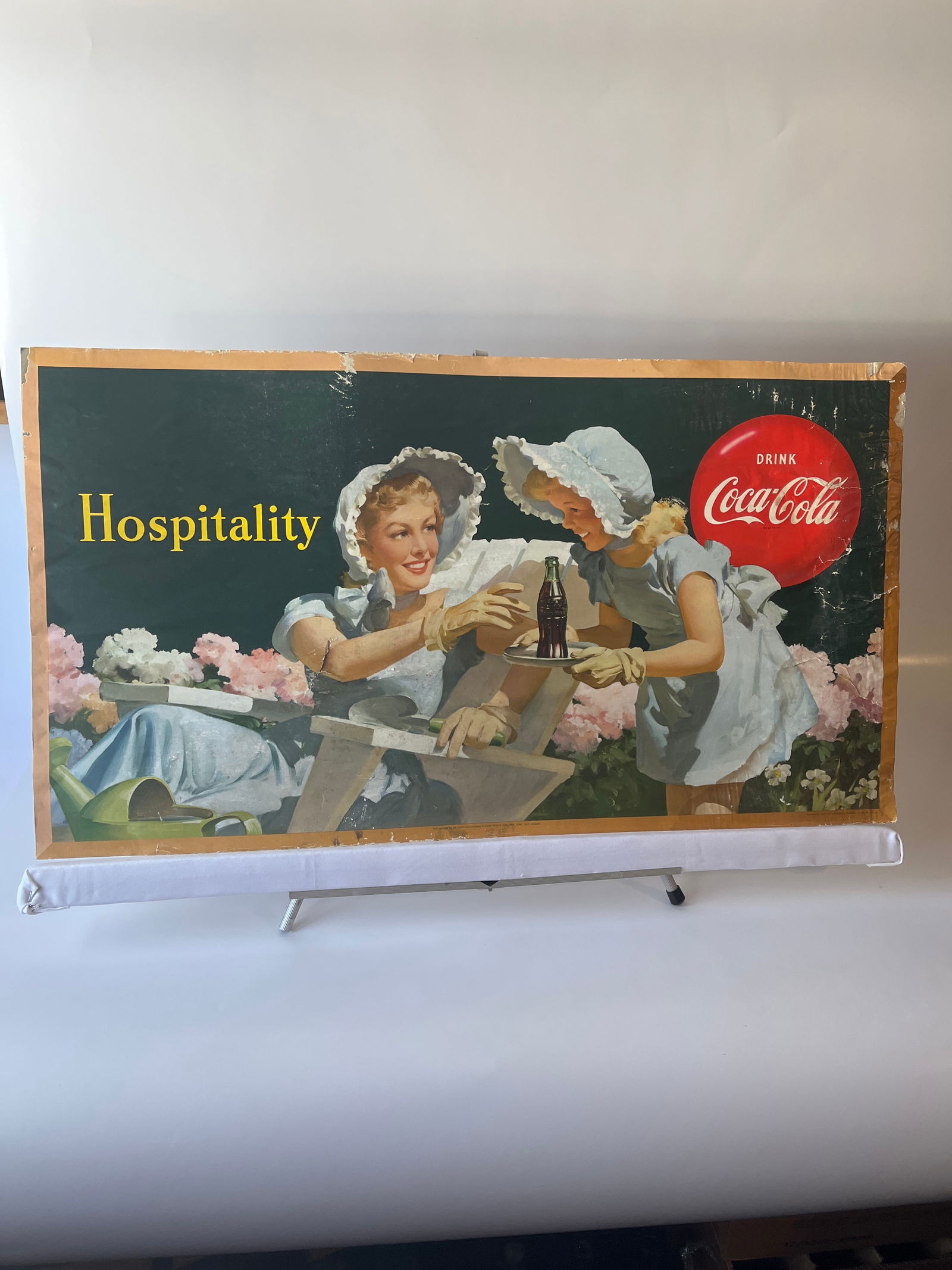 Hospitality Coca-Cola paper on cardboard. 20" X 36".: Hospitality Coca-Cola paper on cardboard. 20" X 36". Some water damage.