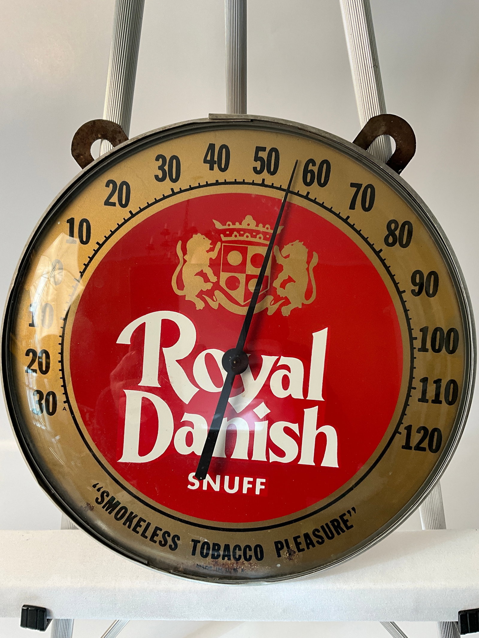 Royal Danish Snuff Advertising Thermometer, Glassface "Smokeless Tobacco Pleasure": Royal Danish Snuff advertising thermometer, Glassface, "Smokeless Tobacco Pleasure." Thermometer measures 12" round. The thermometer has aluminum casing and a great patina. Advertising was used and re