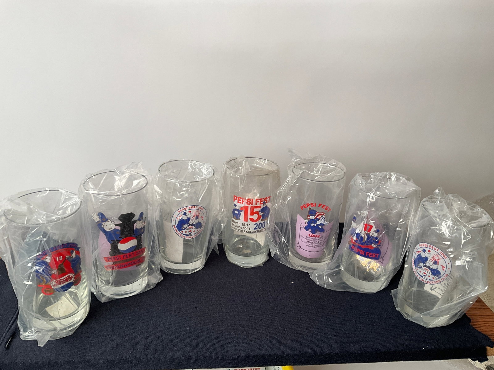 Lot 7 of Pepsi Convention Commenorative Glasses - 2000-2005: Lot 7 of Pepsi Convention Commenorative Glasses - 2000-2005, there are two from the 2000. convention. All glasses are in mint condition